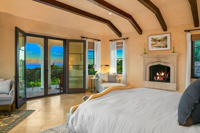 bedroom featuring a water view, multiple windows, access to outside, and vaulted ceiling with beams