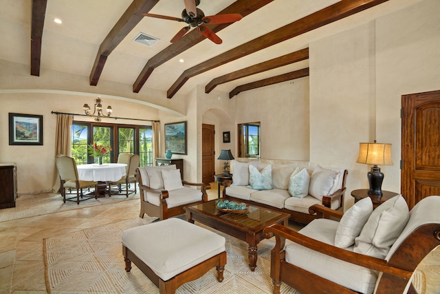 living room featuring ceiling fan with notable chandelier and lofted ceiling with beams