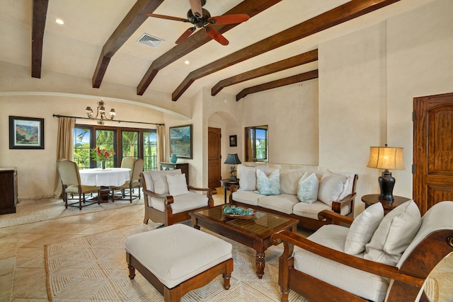 living area with recessed lighting, visible vents, beamed ceiling, arched walkways, and ceiling fan with notable chandelier