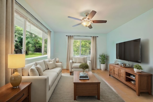 tiled living room featuring ceiling fan