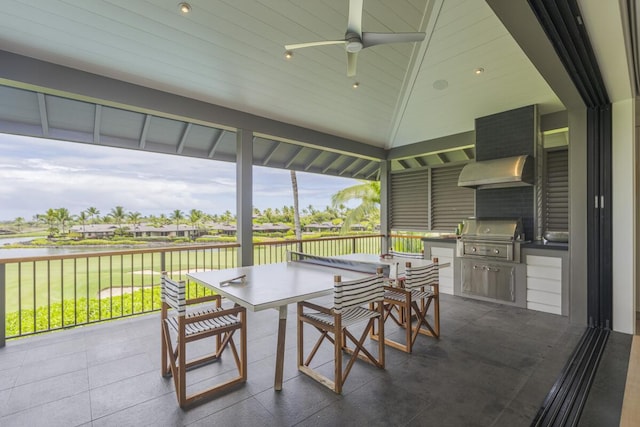 sunroom / solarium featuring ceiling fan and lofted ceiling