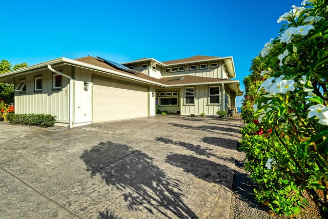 view of front of home with a garage