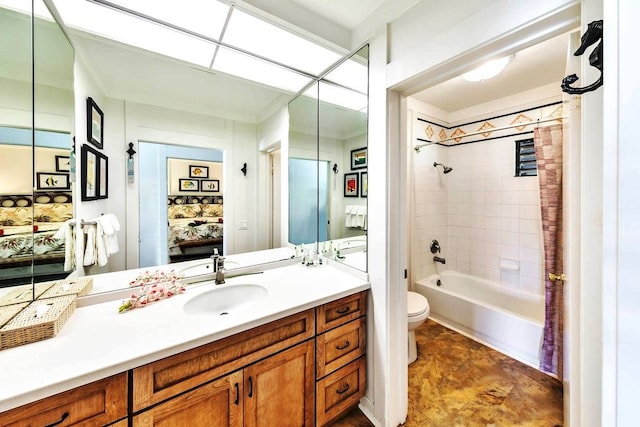 full bathroom with shower / bath combo, vanity, and toilet