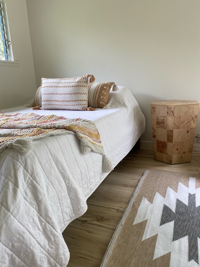 bedroom featuring hardwood / wood-style flooring