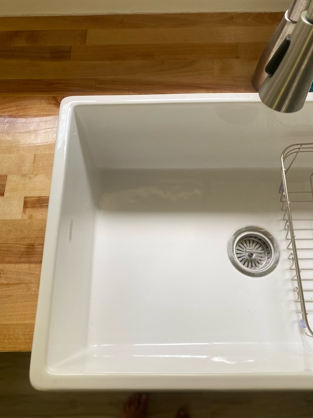 room details with wood walls and sink