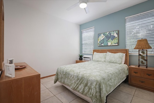 bedroom featuring ceiling fan and light tile patterned flooring