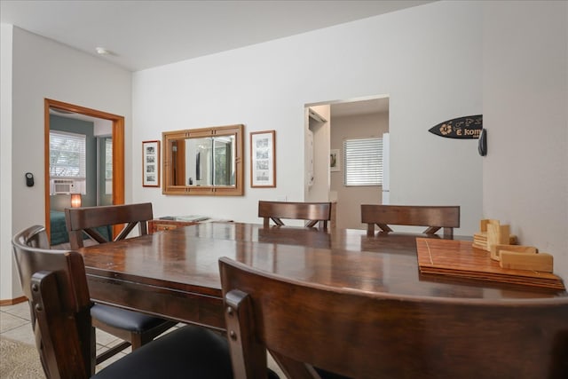 dining room with light tile patterned floors and cooling unit