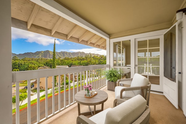 balcony featuring a mountain view