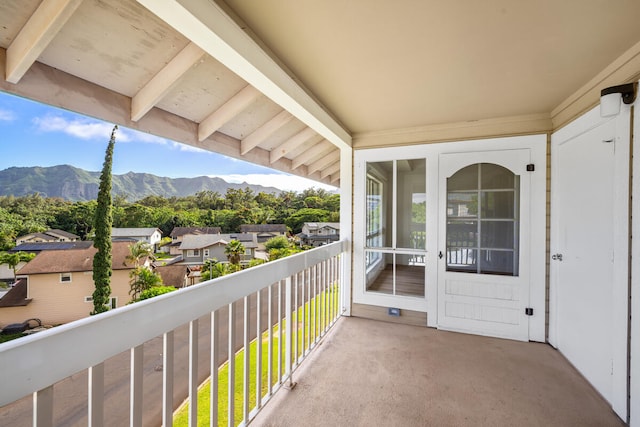 balcony featuring a mountain view