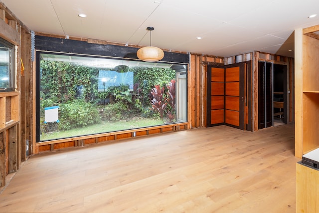 interior space featuring hardwood / wood-style floors and a healthy amount of sunlight