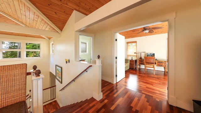 corridor with wood ceiling, dark wood-type flooring, and lofted ceiling