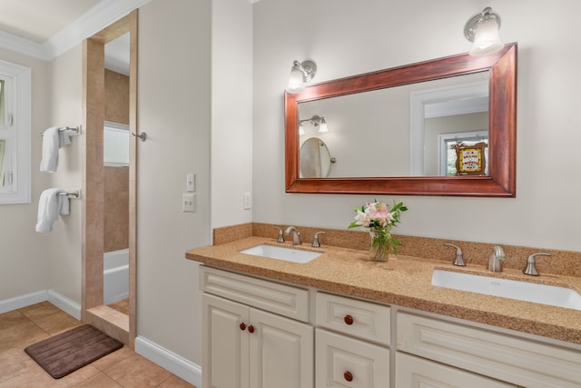 bathroom with crown molding, vanity, plus walk in shower, and tile patterned floors