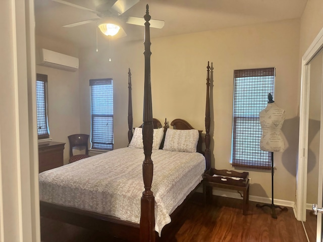 bedroom featuring a wall mounted air conditioner, ceiling fan, and dark hardwood / wood-style floors