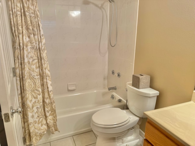 full bathroom featuring tile patterned floors, shower / bath combo with shower curtain, vanity, and toilet