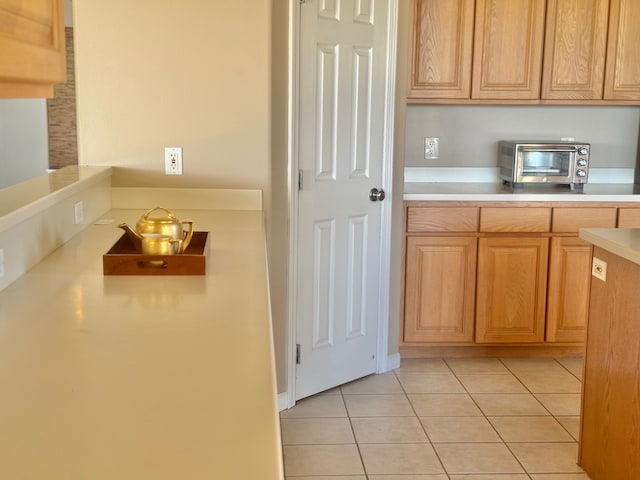 kitchen featuring light tile patterned floors