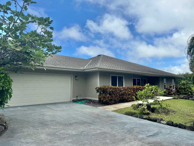 single story home featuring a garage