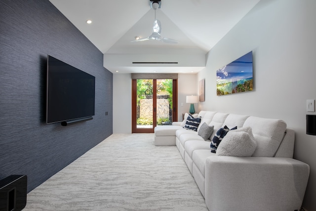 carpeted living room with lofted ceiling