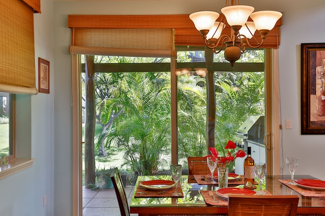 doorway featuring an inviting chandelier