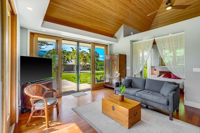 living room with high vaulted ceiling, ceiling fan, wood ceiling, and light hardwood / wood-style floors