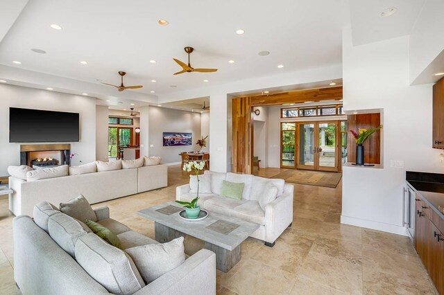 5792 Kahiliholo Rd, Kilauea, HI 96754 - living area with recessed lighting, french doors, baseboards, and a ceiling fan