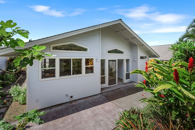 rear view of property featuring a patio