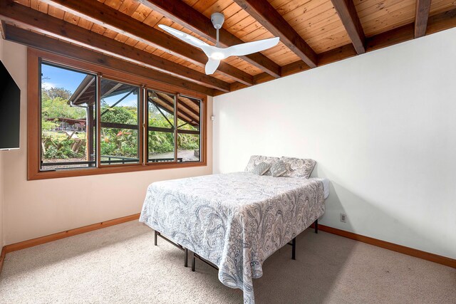 bedroom with wood ceiling, beam ceiling, ceiling fan, and carpet floors