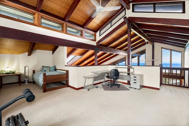 carpeted bedroom featuring lofted ceiling with beams and wood ceiling