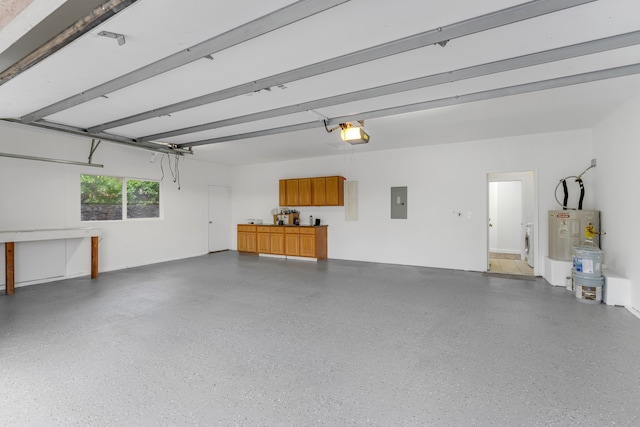 garage featuring washer / dryer, a garage door opener, electric panel, and water heater