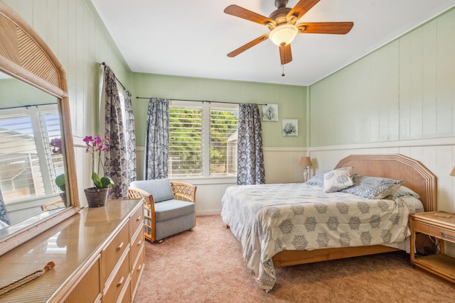 bedroom featuring ceiling fan and light colored carpet