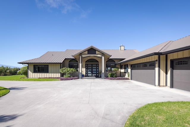 view of front of home with a garage