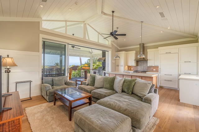 living room featuring wooden ceiling, light wood-type flooring, lofted ceiling with beams, and ceiling fan