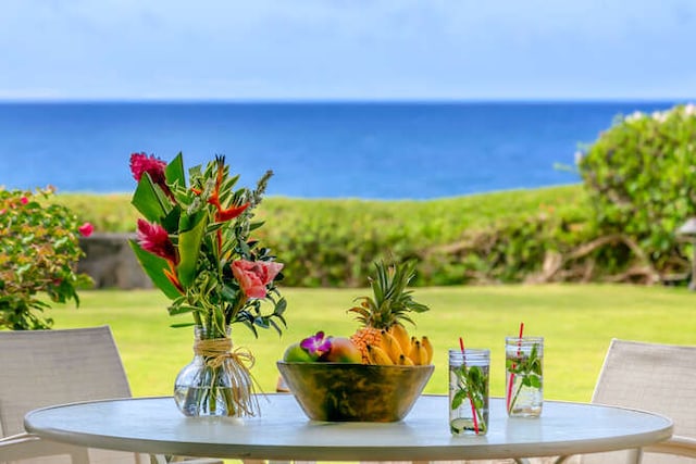 exterior space with a water view