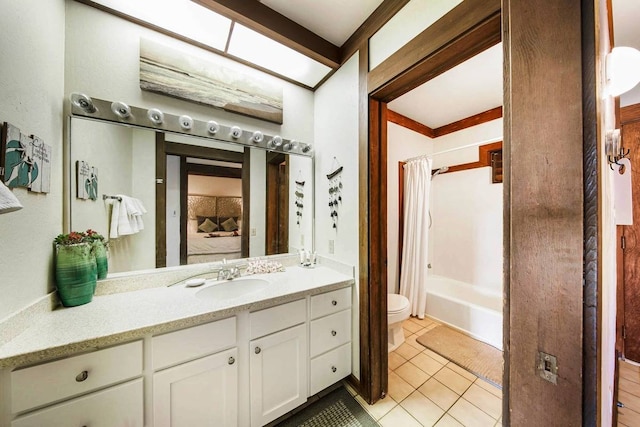 full bathroom with vanity, toilet, shower / bath combination with curtain, and tile patterned floors