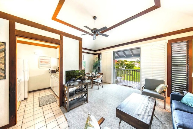 living room featuring ceiling fan and light tile patterned flooring