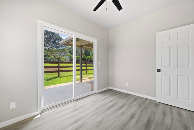 850 Kamalu Rd, Kapaa, HI 96746 - spare room featuring ceiling fan, wood finished floors, and baseboards