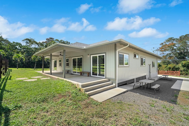850 Kamalu Rd, Kapaa, HI 96746 - rear view of house with a lawn, a patio area, and ceiling fan