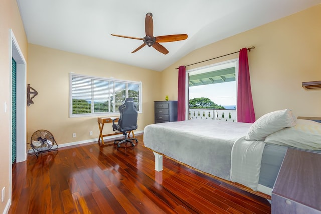 bedroom with baseboards, wood finished floors, a ceiling fan, and vaulted ceiling