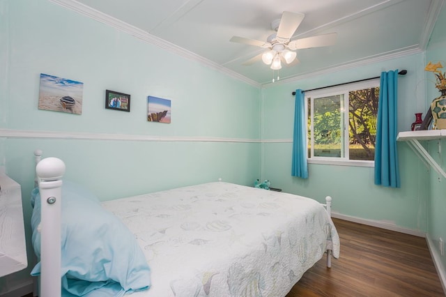 bedroom with ornamental molding, dark hardwood / wood-style flooring, and ceiling fan