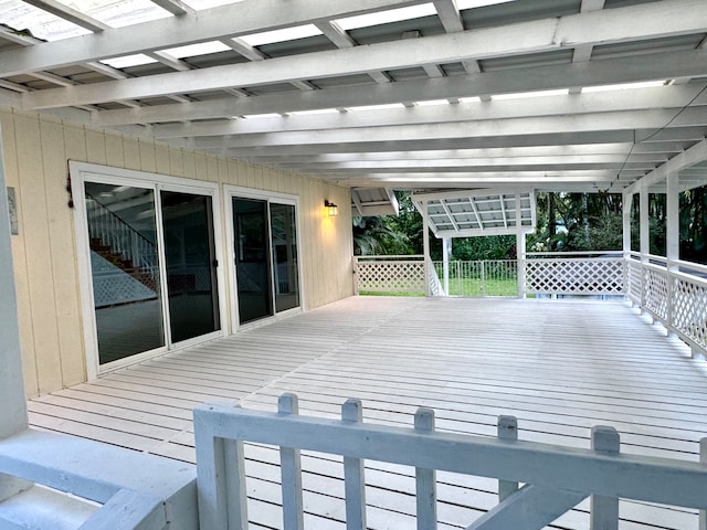 wooden deck featuring a pergola