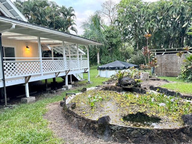 view of yard featuring a deck