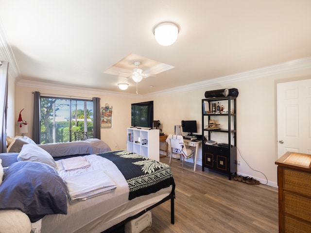 bedroom featuring ceiling fan, ornamental molding, and wood-type flooring