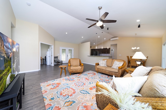 living room featuring ceiling fan with notable chandelier, lofted ceiling, a wall unit AC, and dark hardwood / wood-style floors