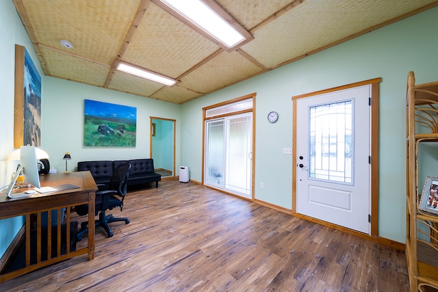 home office with wood-type flooring