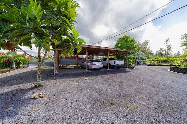 view of parking with a carport