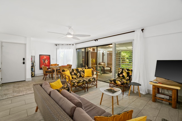 living room featuring ceiling fan