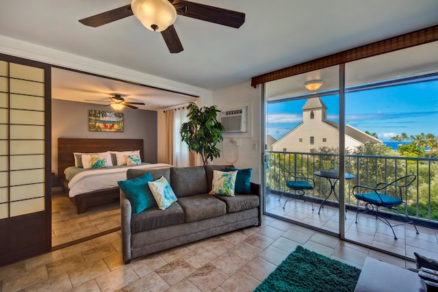 bedroom with ceiling fan and access to outside