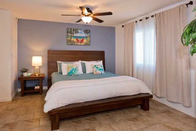 bedroom featuring ceiling fan