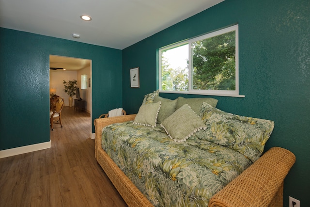 bedroom featuring hardwood / wood-style floors