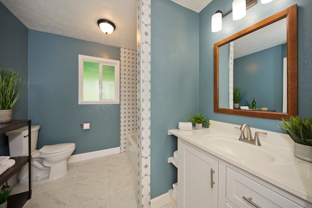 full bathroom with vanity, shower / bath combo, a textured ceiling, and toilet