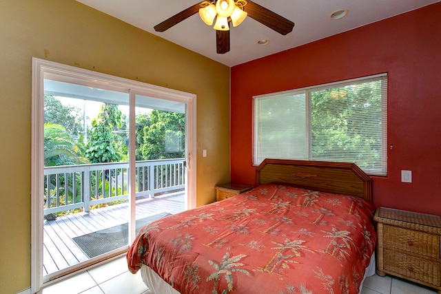 tiled bedroom featuring ceiling fan, multiple windows, and access to outside